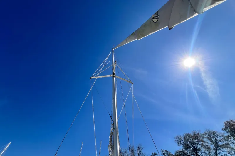 Slide: The Image of Sailboat mast of 2013 Gemini Legacy 35 under clear blue sky and bright sun. - 108