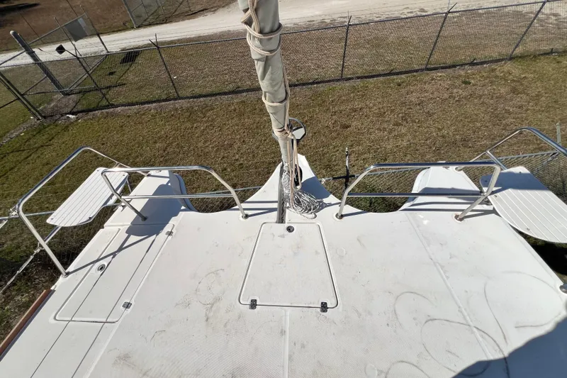 Slide: The Image of Top view of 2013 Gemini Legacy 35 catamaran deck with railing and seating. - 114