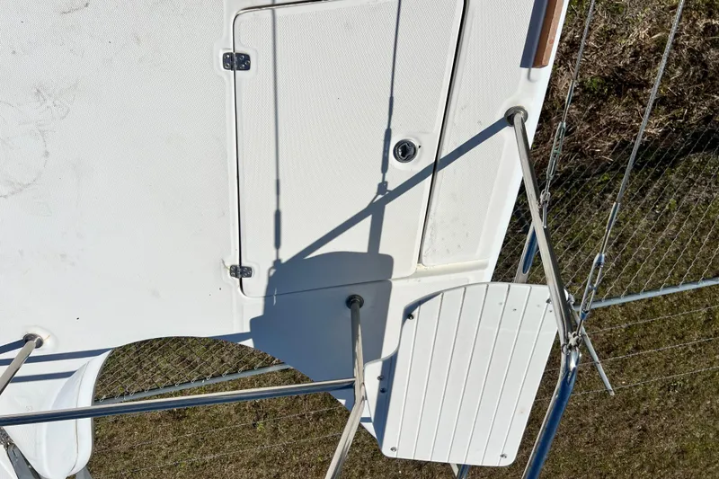 Slide: The Image of Deck view of 2013 Gemini Legacy 35 sailboat, featuring hatch and railing. - 119