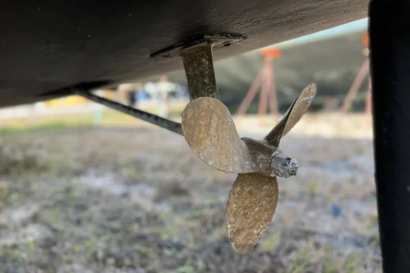 Slide: The Image of Close-up of a 2013 Gemini Legacy 35 boat propeller on land. - 169