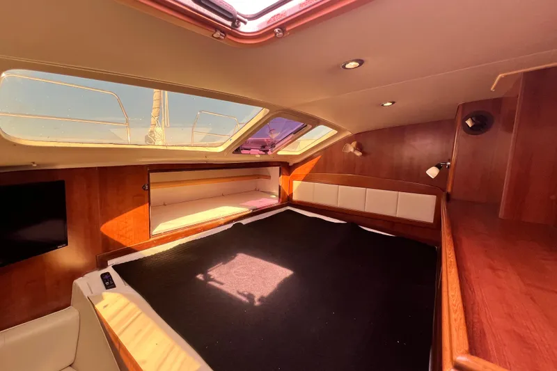 Slide: The Image of Interior of 2013 Gemini Legacy 35 yacht with wood finish and skylights. - 7
