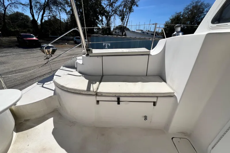 Slide: The Image of 2013 Gemini Legacy 35 boat deck with seating area and railing. - 78