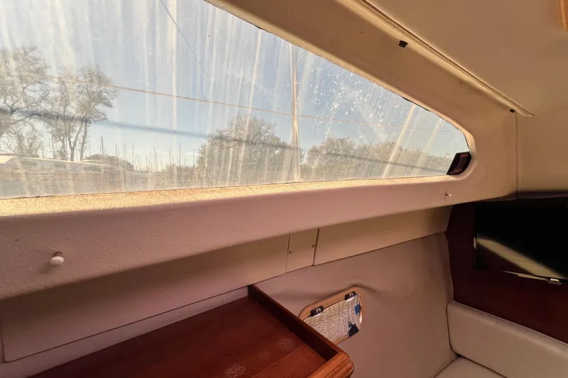 Slide: The Image of Interior view of 2013 Gemini Legacy 35 sailboat with window and seating area. - 8