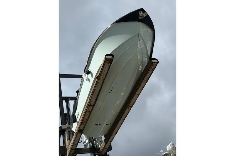 Slide: The Image of 2023 Everglades 285 Center Console interior with dual seats and modern helm controls. - 2