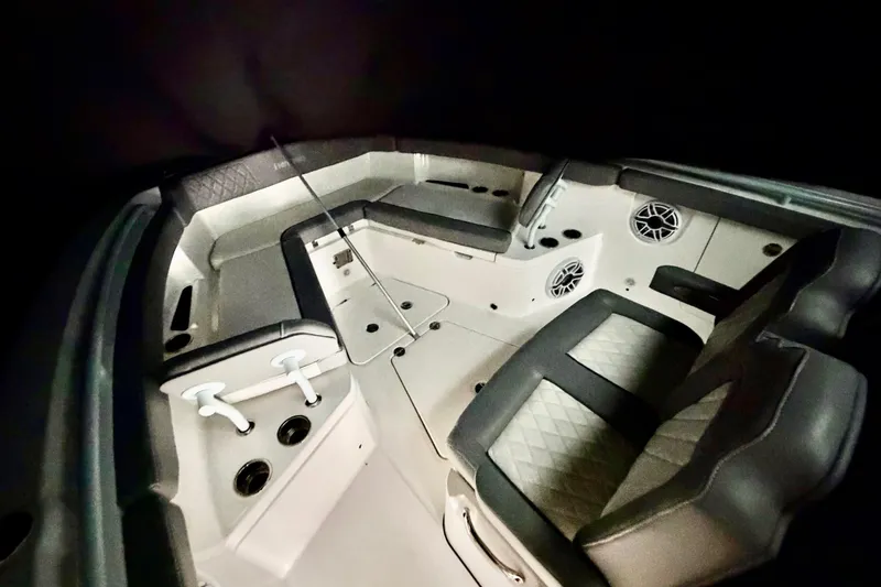 Slide: The Image of 2023 Everglades 285 Center Console boat covered and stored at marina. - 4