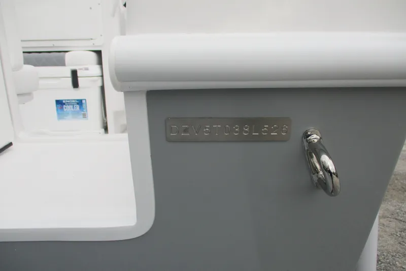 Slide: The Image of 2026 Bluewater 25t boat with visible hull identification number and chrome hardware. - 20