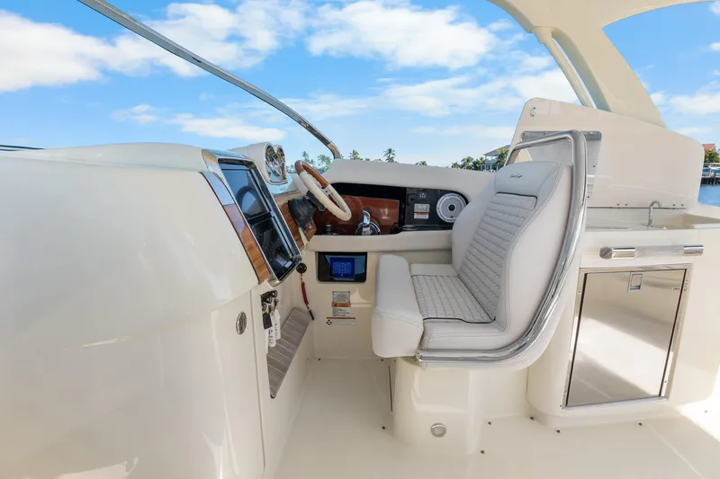 Slide: The Image of 2021 Chris-Craft Launch 35 GT OB helm with luxurious seating and modern controls. - 15