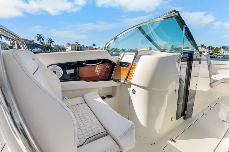 Slide: The Image of 2021 Chris-Craft Launch 35 GT OB interior with luxurious seating and sleek dashboard design. - 22