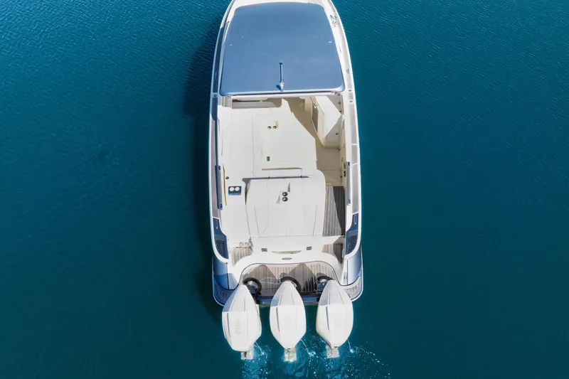 Slide: The Image of Overhead view of 2021 Chris-Craft Launch 35 GT OB on clear blue water. - 30