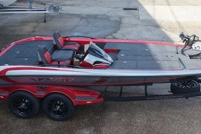 The Image of 2026 Vexus VXs20 boat on trailer, red and gray design, parked outdoors. - 1