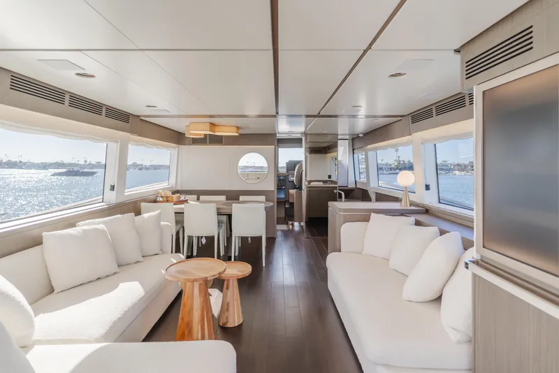 Slide: The Image of Luxurious interior of 2023 Azimut Magellano 66 yacht with elegant seating and ocean views. - 31
