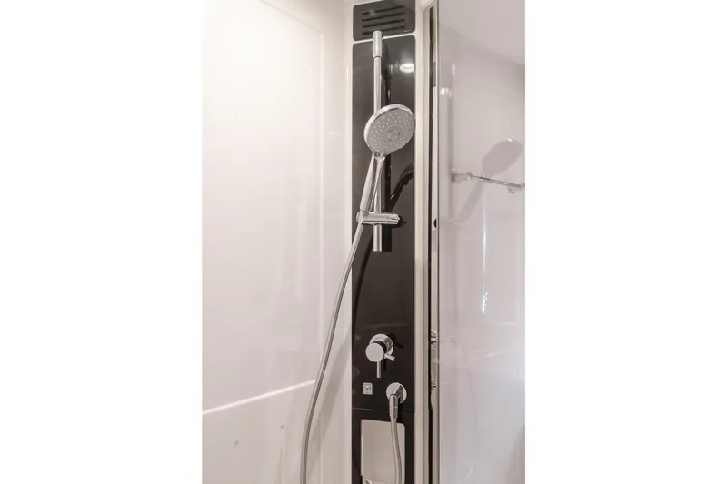 Slide: The Image of Modern shower panel in 2023 Azimut Magellano 66 yacht bathroom. - 45