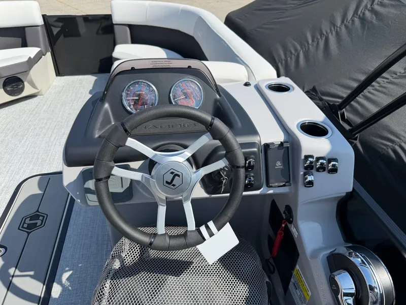 Slide: The Image of Steering wheel and dashboard of Harris FloteBote CRUISER 230 SLDH 2026. - 12