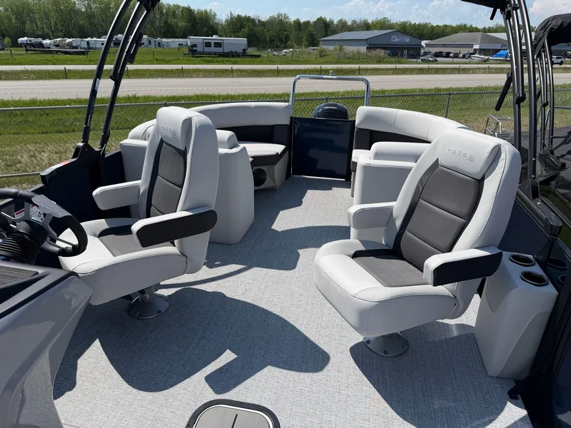 Slide: The Image of Interior of 2026 Harris FloteBote CRUISER 230 CWDH TRI-TOON with luxurious seating. - 7