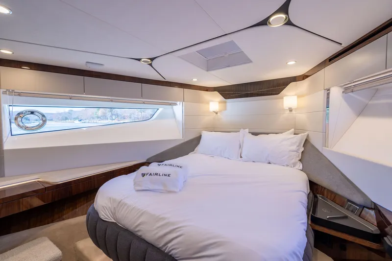 Slide: The Image of Luxurious bedroom interior of 2026 Fairline 58 GTO yacht with elegant design. - 15