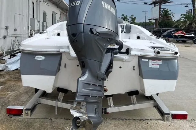 Slide: The Image of 2026 NauticStar 191 Hybrid boat with Yamaha 150 engine on trailer. - 8