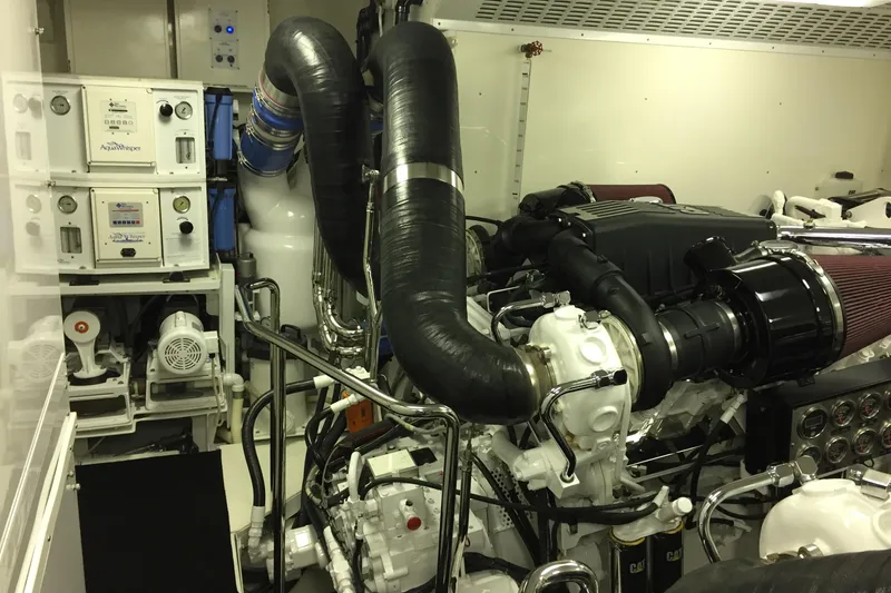 Slide: The Image of Luxurious 2006 Northcoast Yachts Yachtfisher kitchen with modern appliances and elegant wood finishes. - 15