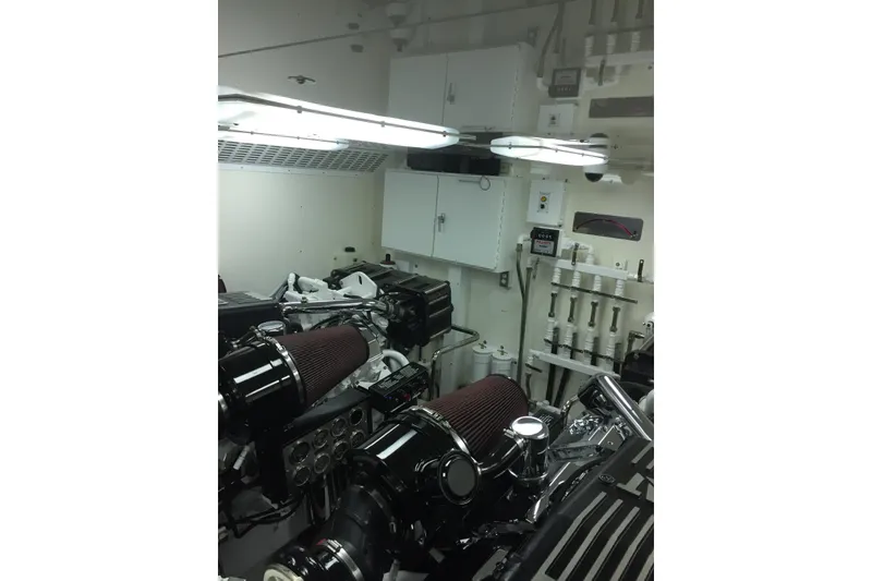 Slide: The Image of Luxurious 2006 Northcoast Yachts Yachtfisher cabin with cozy bunk beds and elegant wood finish. - 24