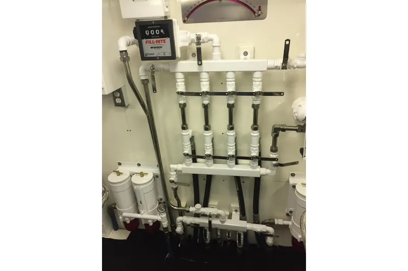 Slide: The Image of Luxurious bathroom in 2006 Northcoast Yachts Yachtfisher with marble countertop and modern fixtures. - 25