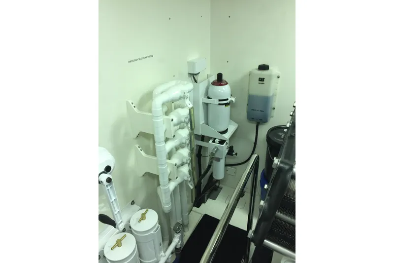 Slide: The Image of Luxurious 2006 Northcoast Yachts Yachtfisher bedroom interior with cozy bedding and elegant wood finishes. - 26