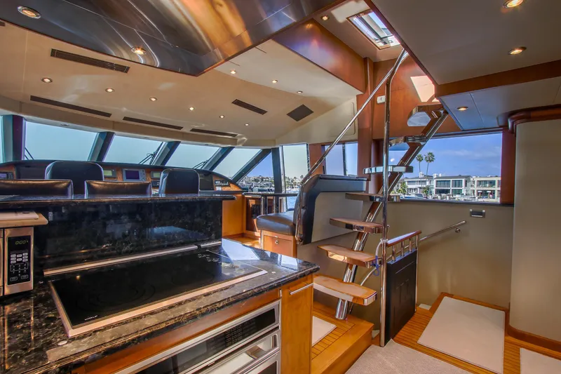 Slide: The Image of 2006 Northcoast Yachts Yachtfisher cruising on a sunny day near the coastline. - 37