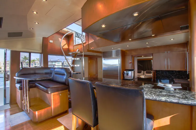 Slide: The Image of 2006 Northcoast Yachts Yachtfisher cruising in a scenic harbor with clear blue skies. - 39