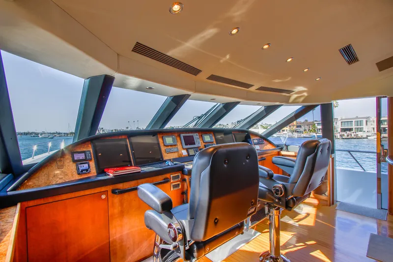 Slide: The Image of Luxurious 2006 Northcoast Yachts Yachtfisher with elegant outdoor seating and dining area. - 40