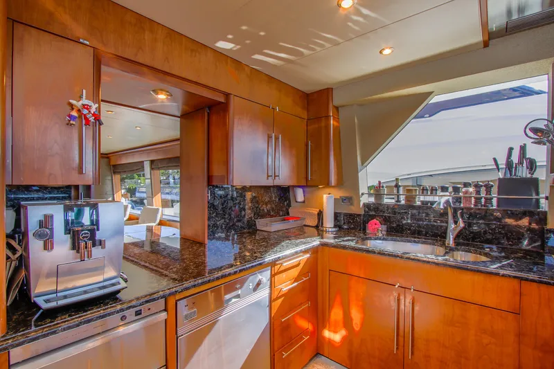 Slide: The Image of 2006 Northcoast Yachts Yachtfisher deck view with marina and waterfront homes. - 42