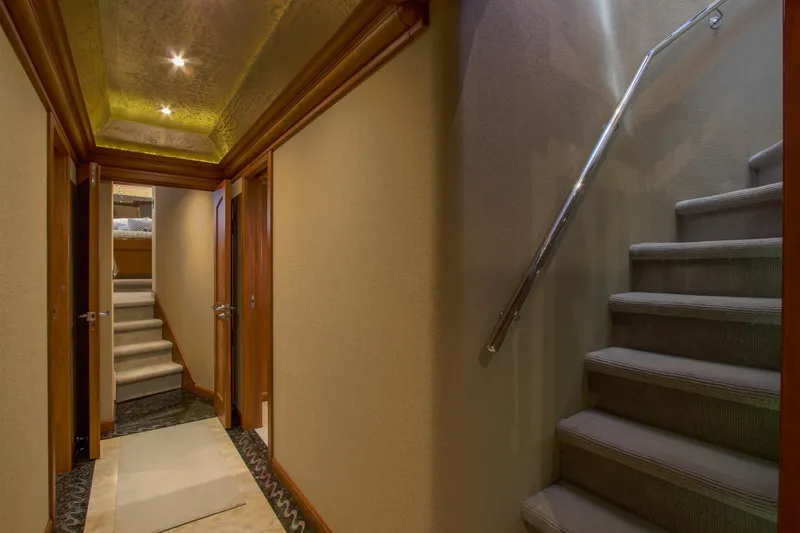 Slide: The Image of Luxurious 2006 Northcoast Yachts Yachtfisher deck with striped seating and scenic marina view. - 44