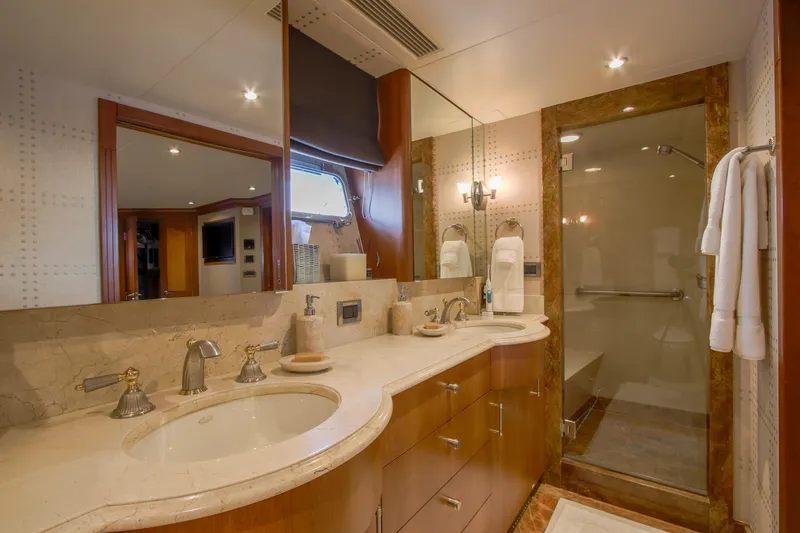 Slide: The Image of Engine room of a 2006 Northcoast Yachts Yachtfisher, showcasing detailed mechanical components. - 47