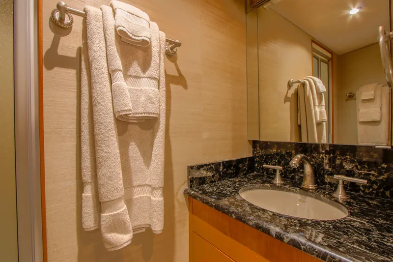 Slide: The Image of Engine room of a 2006 Northcoast Yachts Yachtfisher, featuring complex machinery and equipment. - 49