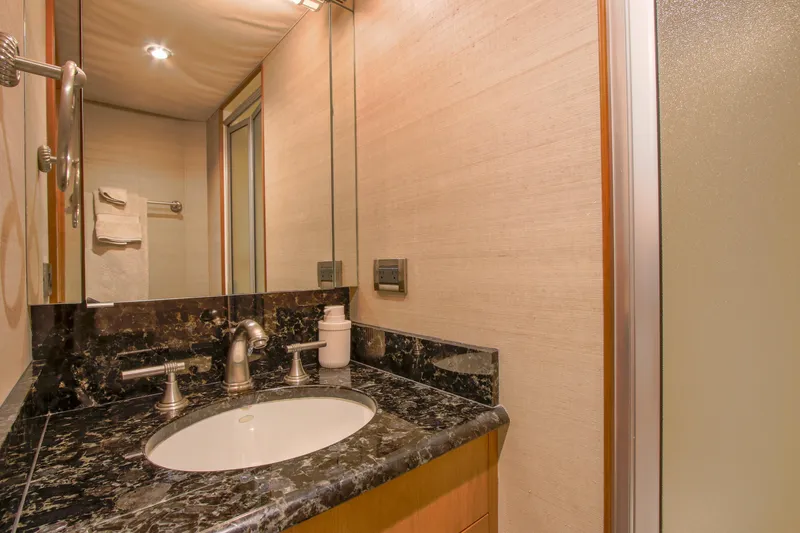 Slide: The Image of Engine room of 2006 Northcoast Yachts Yachtfisher, featuring gauges and air filter. - 51