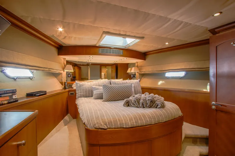 Slide: The Image of Modern kitchen interior of 2006 Northcoast Yachts Yachtfisher, featuring sleek cabinetry and stainless steel accents. - 52