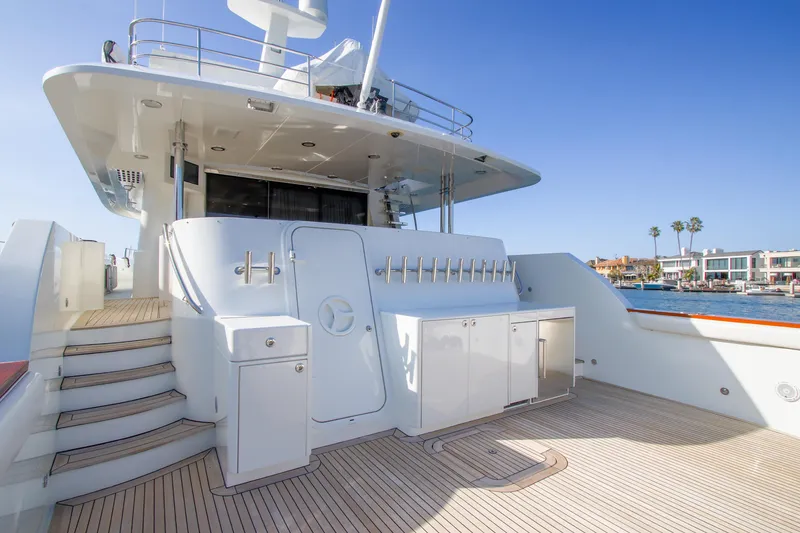 Slide: The Image of 2006 NorthCoast PILOTHOUSE inflatable boat on water, featuring a 90 HP outboard motor. - 57