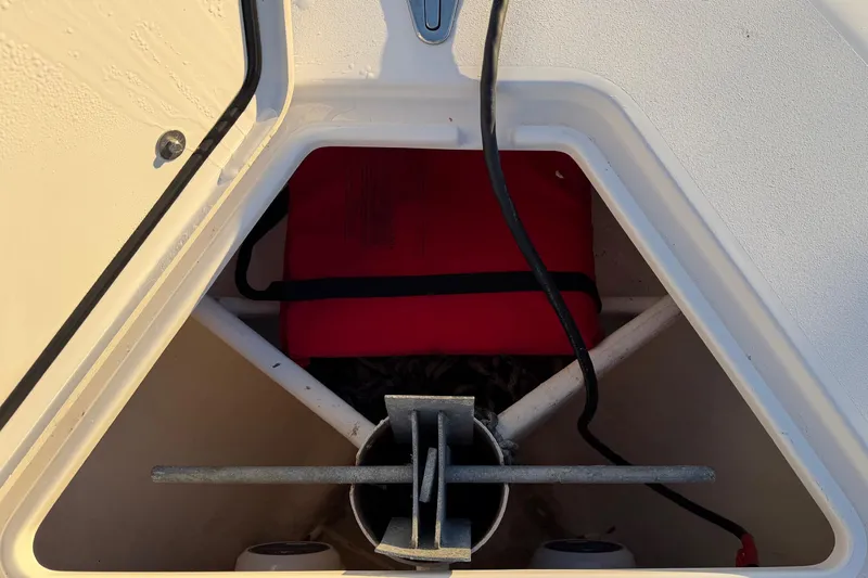 Slide: The Image of Anchor storage compartment on a 2020 Contender 32 ST boat. - 100