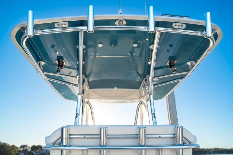 Slide: The Image of 2020 Contender 32 ST boat with sleek T-top and stainless steel frame. - 15