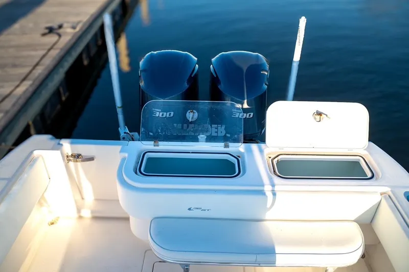 Slide: The Image of 2020 Contender 32 ST boat with twin Yamaha 300 engines at dock. - 22