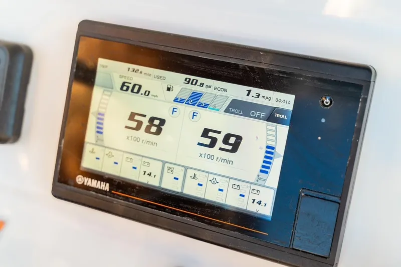 Slide: The Image of Yamaha display on 2020 Contender 32 ST showing speed and engine data. - 42