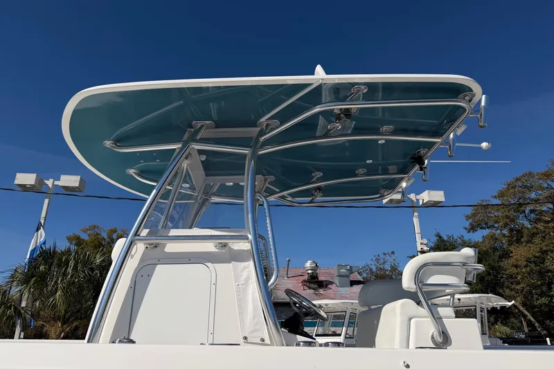 Slide: The Image of 2020 Contender 32 ST boat with sleek T-top and modern design. - 51