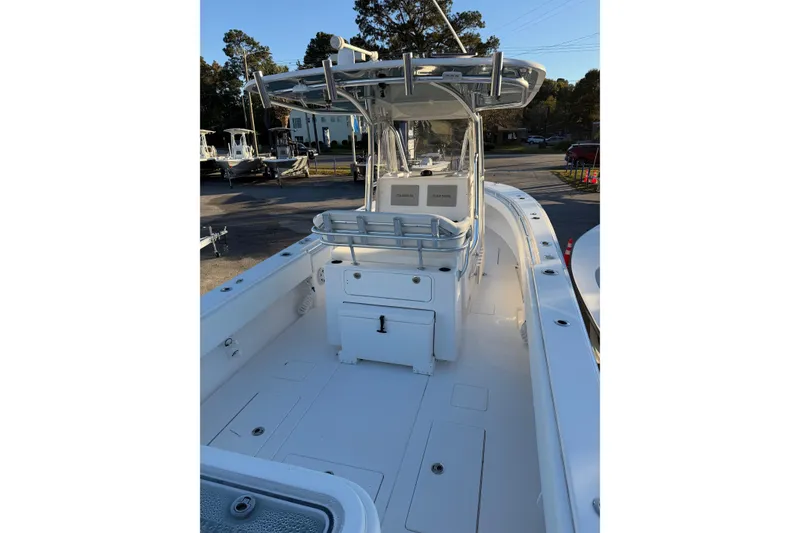 Slide: The Image of 2020 Contender 32 ST boat interior with center console and seating. - 52