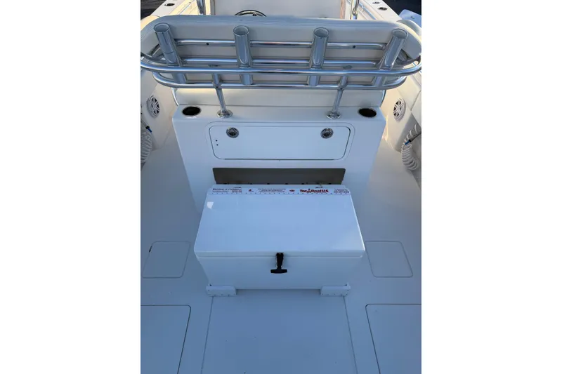 Slide: The Image of 2020 Contender 32 ST boat interior with storage and seating area. - 56