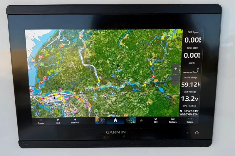 Slide: The Image of Garmin GPS display on 2020 Contender 32 ST boat, showing detailed navigation map. - 76