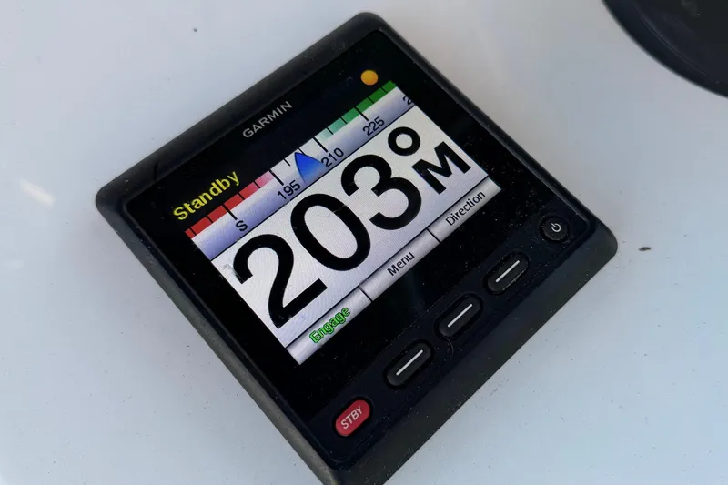 Slide: The Image of Garmin marine compass display showing 203 degrees on Contender 32 ST, 2020 model. - 77