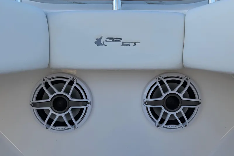 Slide: The Image of 2020 Contender 32 ST boat with JL Audio speakers and logo detail. - 80