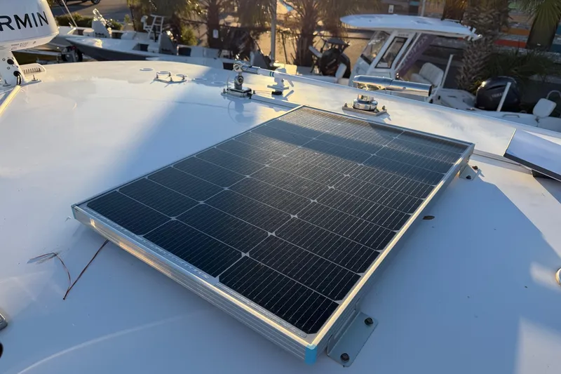 Slide: The Image of Solar panel on 2020 Contender 32 ST boat, enhancing energy efficiency. - 86