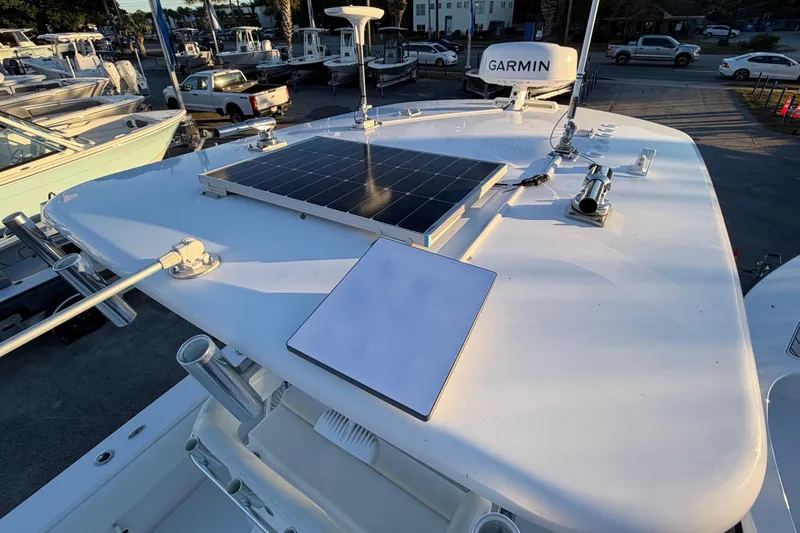 Slide: The Image of 2020 Contender 32 ST boat with solar panel and Garmin equipment on deck. - 89