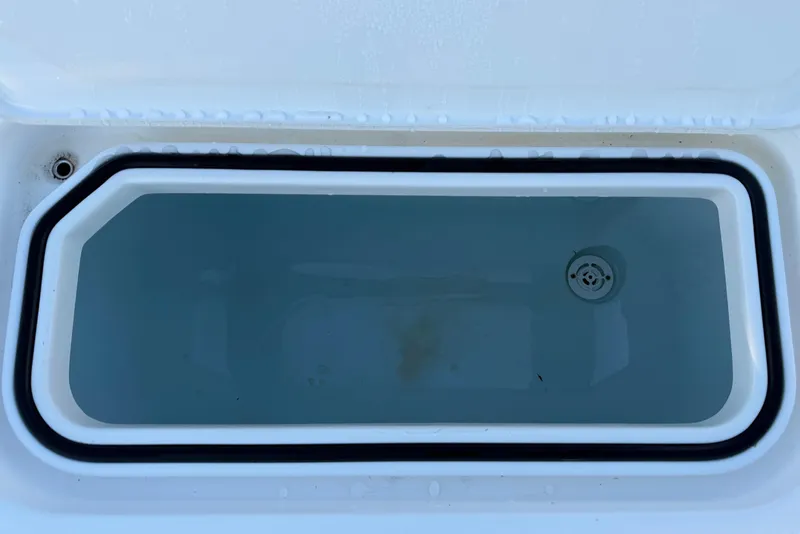 Slide: The Image of Livewell on 2020 Contender 32 ST boat, filled with water. - 98