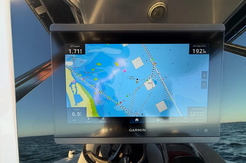 Slide: The Image of Garmin GPS display on 1999 Donzi 35 ZF Cuddy, showing nautical map and navigation data. - 15