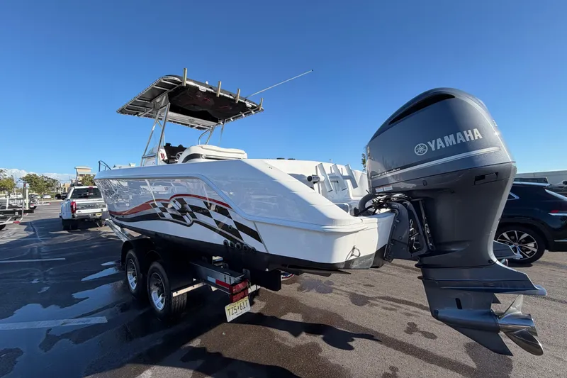 Slide: The Image of 1999 Donzi 35 ZF Cuddy boat with Yamaha outboard motor on trailer. - 2