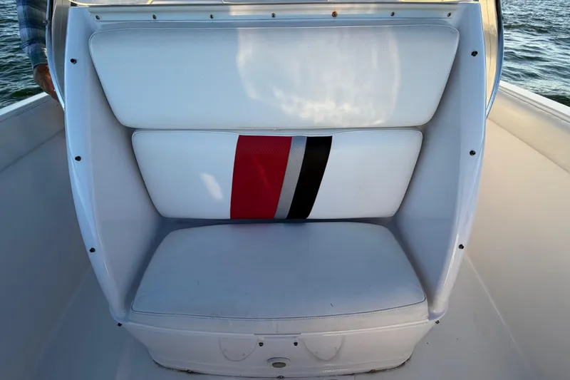 Slide: The Image of White and red seat on 1999 Donzi 35 ZF Cuddy boat. - 25